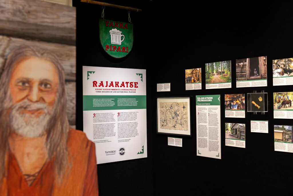 Photographs on the walls of an exhibition.